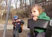 Jerry's kids having fun on the swings