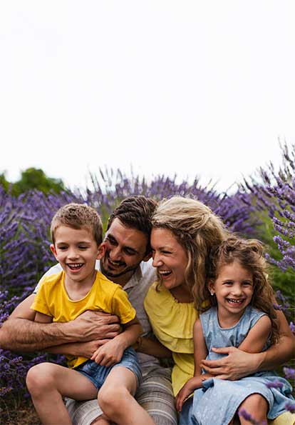 Young family enjoying on lavender field